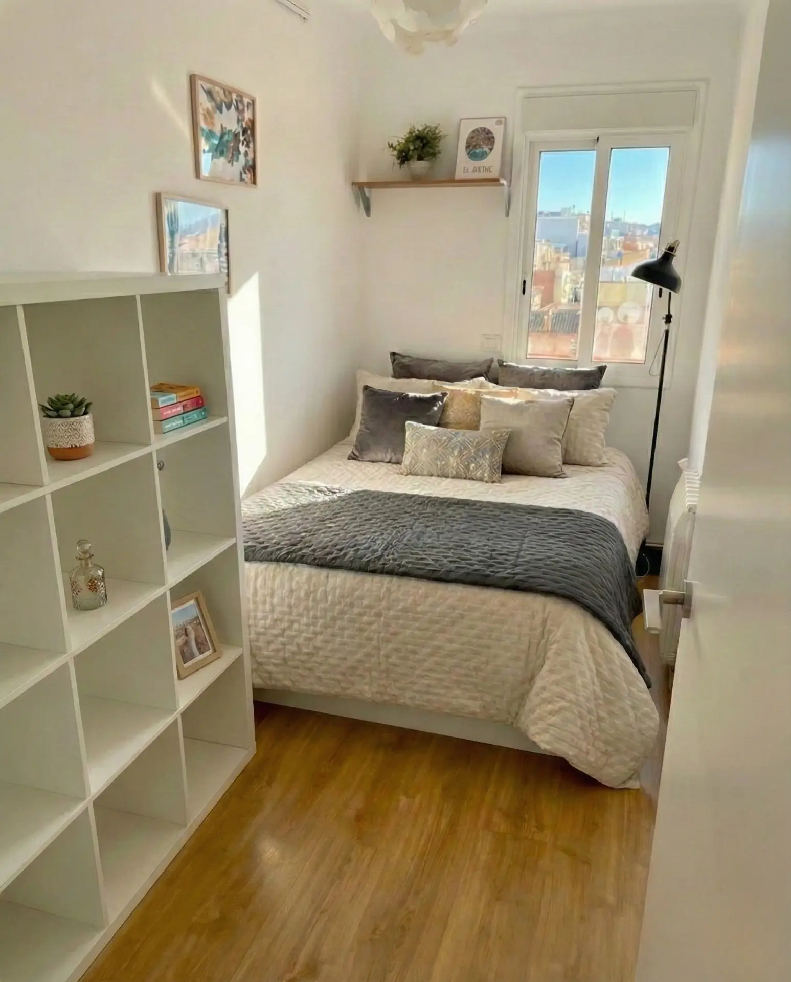 Bedroom three, with shelving and a rooftop view